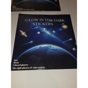 glow-in-the-dark wall and ceiling stickers featuring a solar system design with